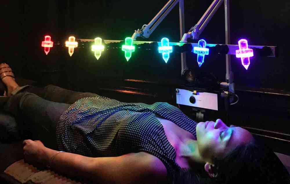 Woman Undergoig Crystal Bed Light Therapy - The Top Benefits of Crystal Bed Light Therapy